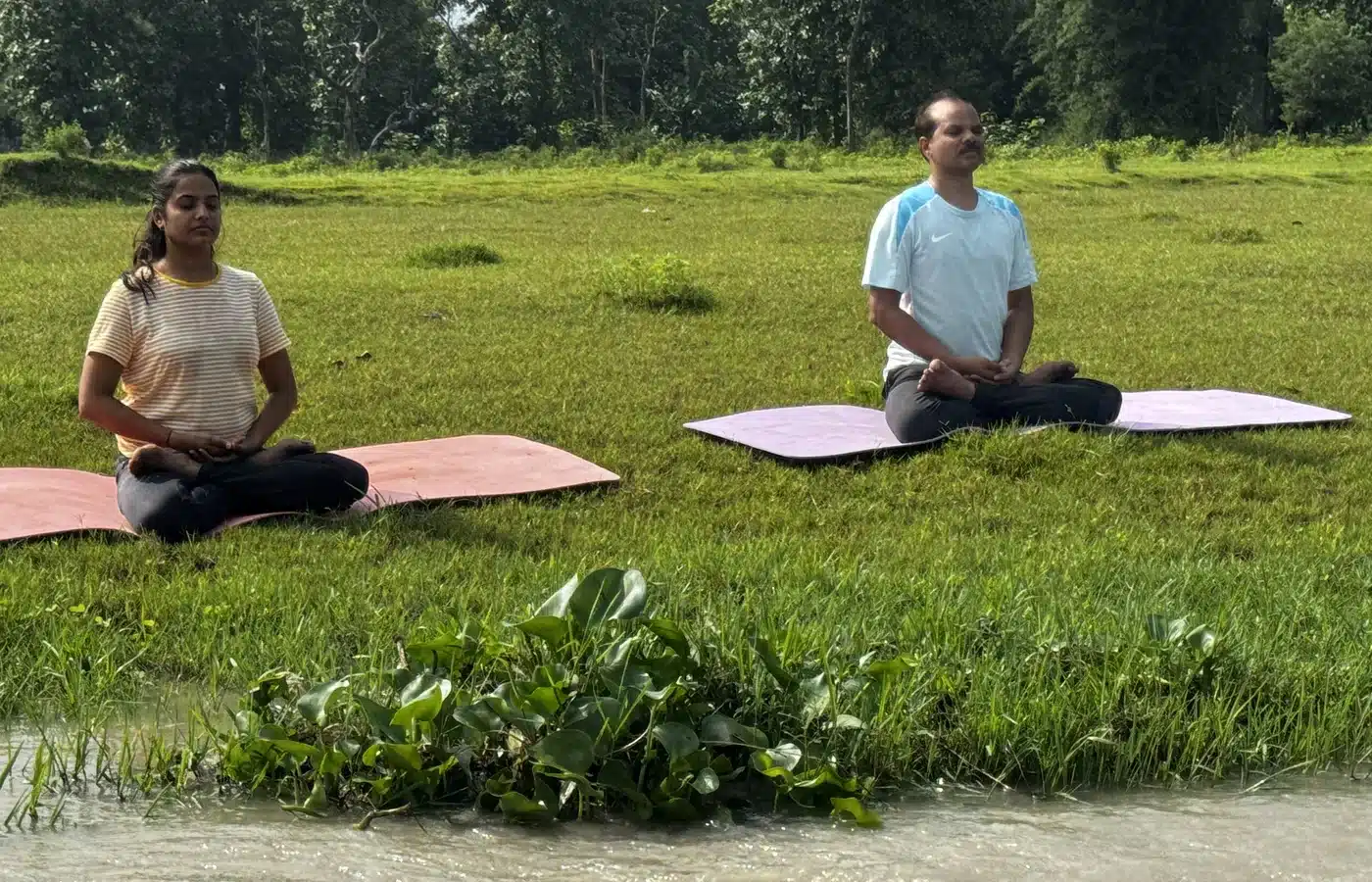 Outdoor meditation near the Ganga during Yan Cure wellness retreat in Rishikesh
