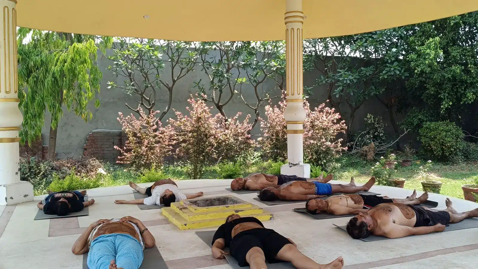 Original Yan Cure mud therapy session for Ayurvedic detox retreat in Rishikesh