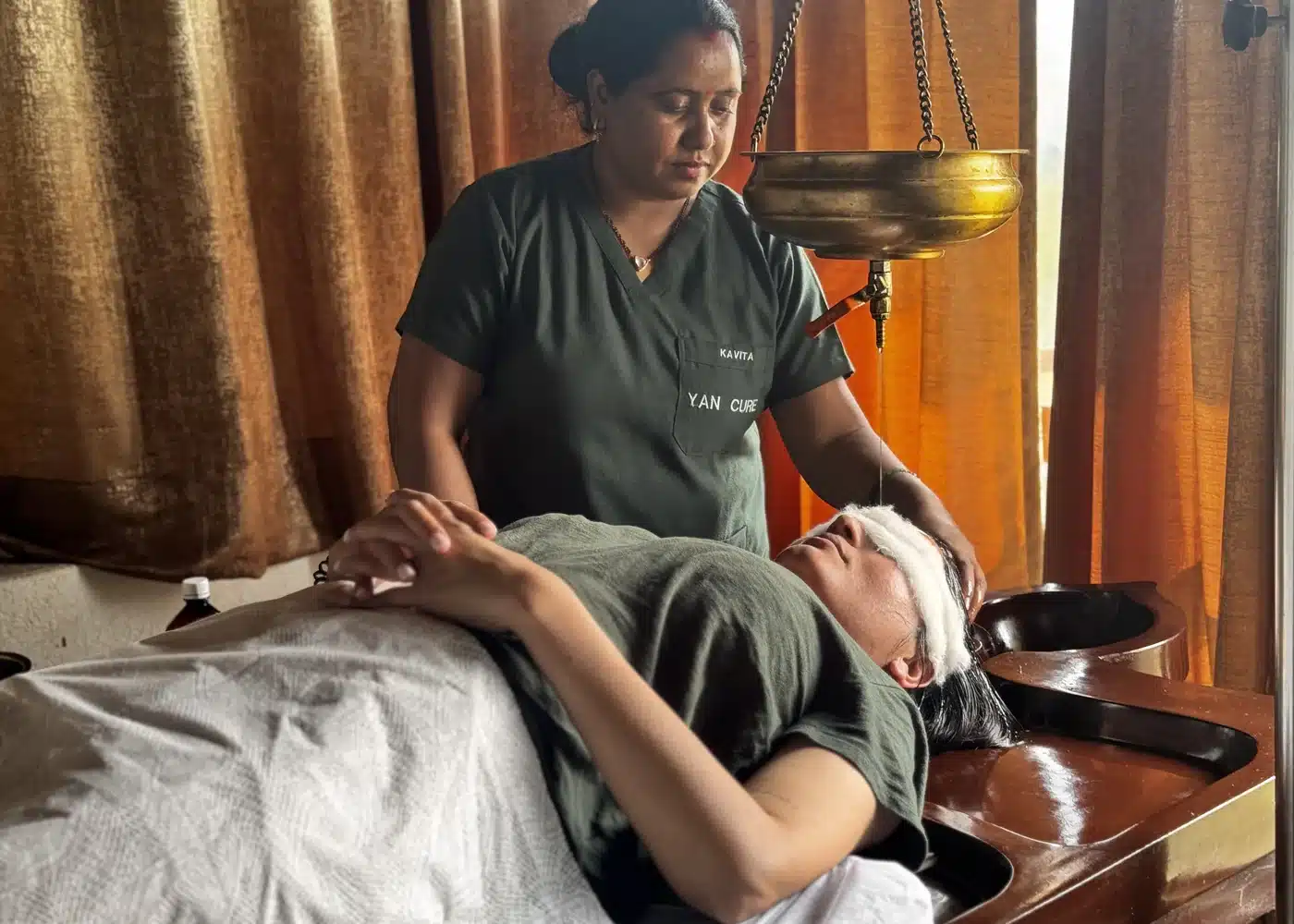 Shirodhara therapist care at Yan Cure in Rishikesh